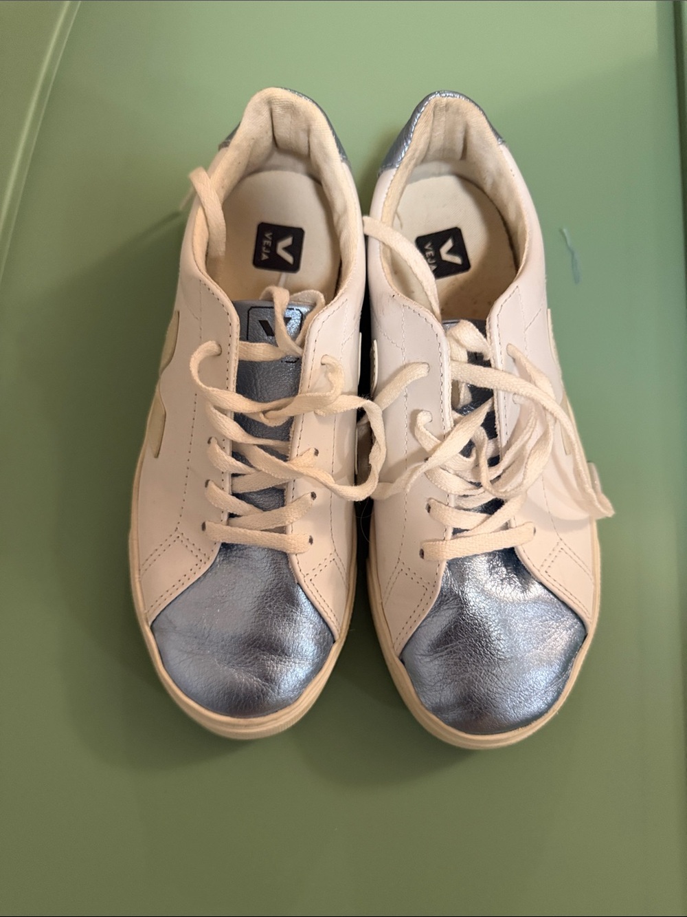 Veja White Sneakers with Metallic Silver Toe and Heel Accents
